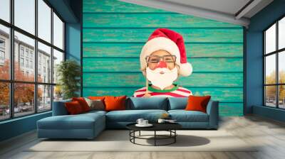 Funny kid on Christmas eve Wall mural