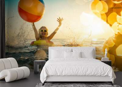 Happy child having fun on summer vacation Wall mural