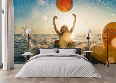 Happy child having fun on summer vacation Wall mural