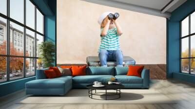 Happy child playing at home Wall mural