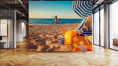 Happy family on the beach Wall mural