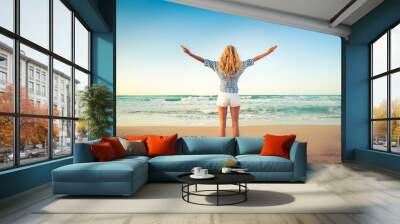 Happy woman having fun on summer vacation Wall mural