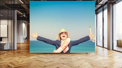 Successful young businesswoman on a beach Wall mural