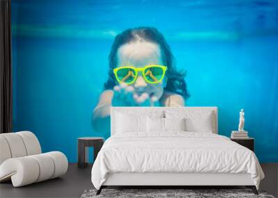 Underwater portrait of child Wall mural