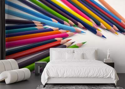 Colorful sharpened pencils are lined up on the table. Wall mural