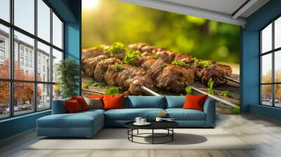 A closeup of juicy kebab on a wooden board against a green natural background, with sunlight and a bokeh effect. Wall mural