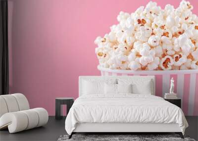 A pink popcorn bucket filled with popcorn, banner with copy space. Wall mural