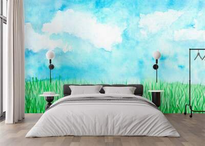 Watercolor hand drawn sunny meadow with green grass and blue sky with clouds. Copy space, aquarelle design Wall mural