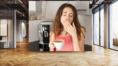 Sleepy woman in the morning drinking coffee Wall mural