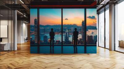 Two Businessmen Looking Out at Hong Kong Skyline at Sunset Wall mural