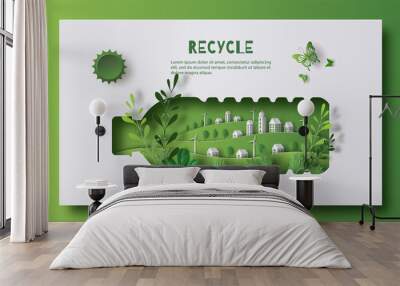 A bottle of water with a green city inside, the idea is to recycle old plastic bottles, think green, paper illustration, and 3d paper. Wall mural