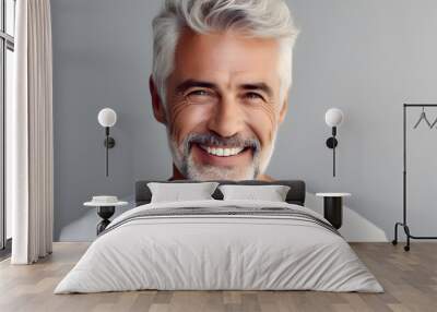 Handsome senior male model with white hair, laughing and smiling, displaying vibrant health with great skin and teeth. Wall mural