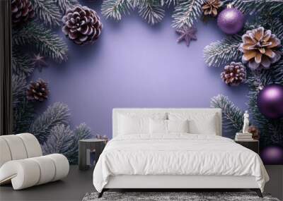 Lilac background with frame of pine needles and ornaments with copy space Wall mural