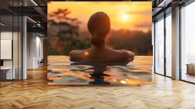 Woman Relaxing in Infinity Pool at Sunset with Scenic Nature View in the Background Wall mural