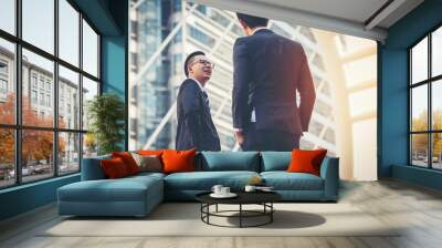 Businessmen meeting on the stairs. Wall mural