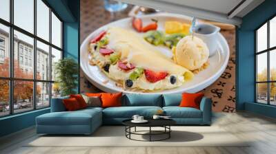 Cold crepes, vanilla ice cream with crepes and strawberry, sweet and desserts Wall mural