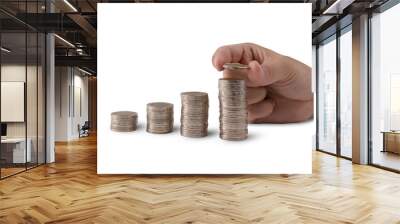 Saving money,A man hand putting money coin to stack growing business isolated on white background. Wall mural