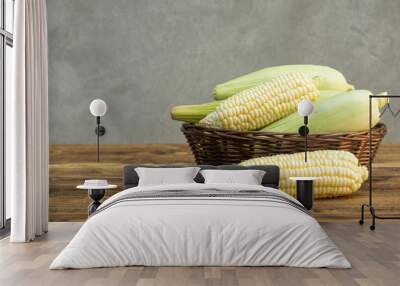 Pure white corn on a wooden table. Wall mural