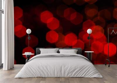 Red bokeh on a dark background. Wall mural