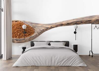 Brown Teff Grain in wood spoon on white Wall mural