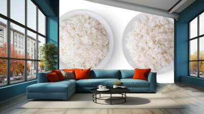 cooked rice in white plate on white background Wall mural