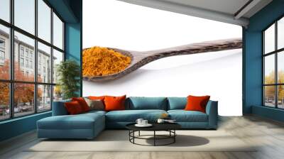 turmeric in wood spoon on white background Wall mural