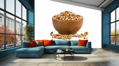 dried organic buckweat whit wooden bowl on a white Wall mural