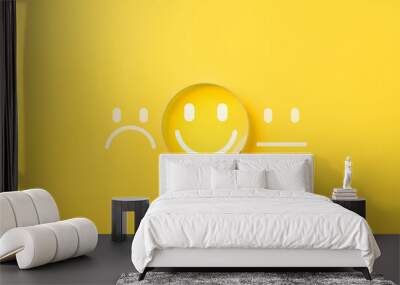 Customer review satisfaction feedback survey concept to gather insights and improve its services. A magnifying glass focuses on smile face among different feedback emoticons on yellow background Wall mural