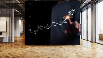 startup business and investment concept. businessman is touching the growing business graph. plannin Wall mural