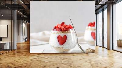 Healthy dessert with chia seeds and strawberries on the white background. Wall mural