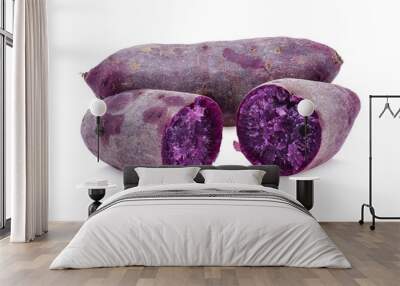 Ripe sweet purple potatoes on white background Wall mural