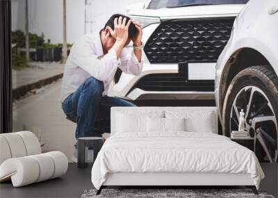 Stressed Asian man hit by car He sat in front of the car with his hands on his head. Transportation concept. car insurance Wall mural