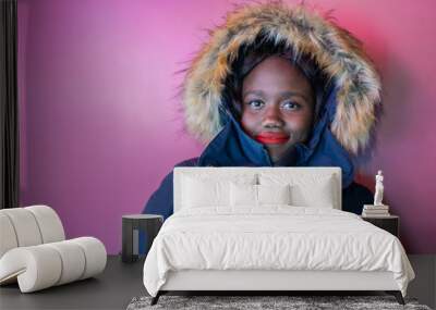 Black young woman looking to camera over pink background  Wall mural