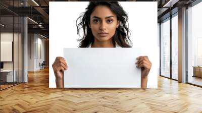 Front view mid body shot of an Indian woman holding a blank white placard in a white blouse and black skirt, isolated on a white transparent background Wall mural