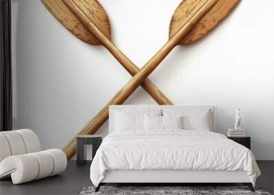 A pair of crossed wooden oars, showcasing craftsmanship and design, ideal for water sports and outdoor adventures, white background Wall mural