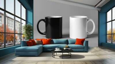 two coffee cups, black and white mugs, mockup, isolated on grey background.  Wall mural