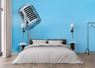 Retro microphone on blue background Wall mural