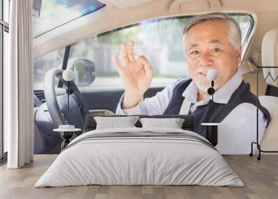 Portrait Of Smiling Asian senior man , old man , Elderly man driving a car Wall mural