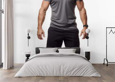 portrait of a muscular physique male wear sport T-shirt and standing confidently isolated Wall mural