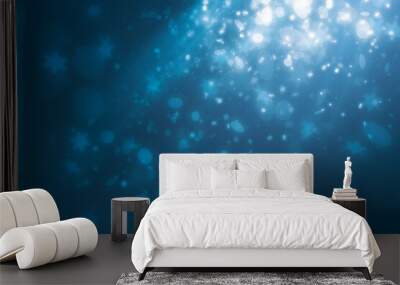 Blue spot light effect with snowflakes light falling and mini glitter floating on blue background Wall mural