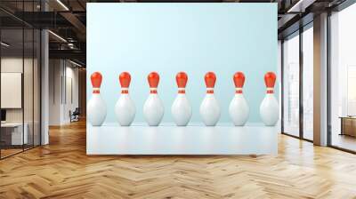 A set of classic bowling pins arranged neatly on a smooth surface, showcasing their bright white bodies and vibrant red tops. Wall mural