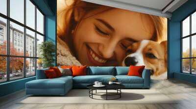 A joyful moment between a woman and her dog, showcasing companionship and happiness. Wall mural