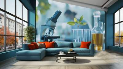 A laboratory setting with a microscope, plant, and glassware for scientific research. Wall mural