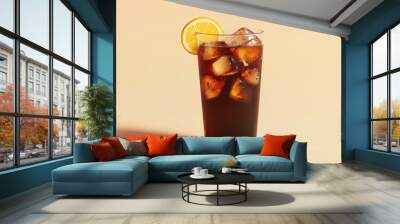 A refreshing glass of iced cola with a lemon slice and ice cubes. Wall mural