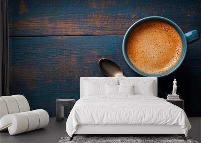 A steaming cup of coffee on a wooden table. Wall mural