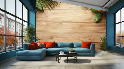 A tropical arrangement featuring coconuts and palm leaves on a wooden surface. Wall mural