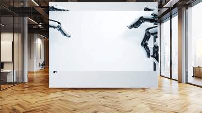 Two robotic hands reaching for a blank screen, symbolizing technology and communication. Wall mural