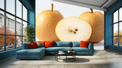 Two whole pears and one sliced pear, showcasing their texture and seeds. Wall mural