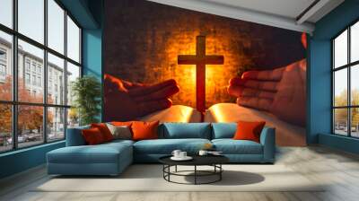 Cross with bible and light of candle background on wooden table. christian praying concept. Wall mural