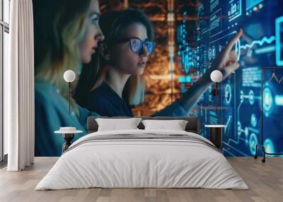 A focused businesswoman is interacting with a futuristic digital display, analyzing complex financial data in a dark, modern office. Wall mural